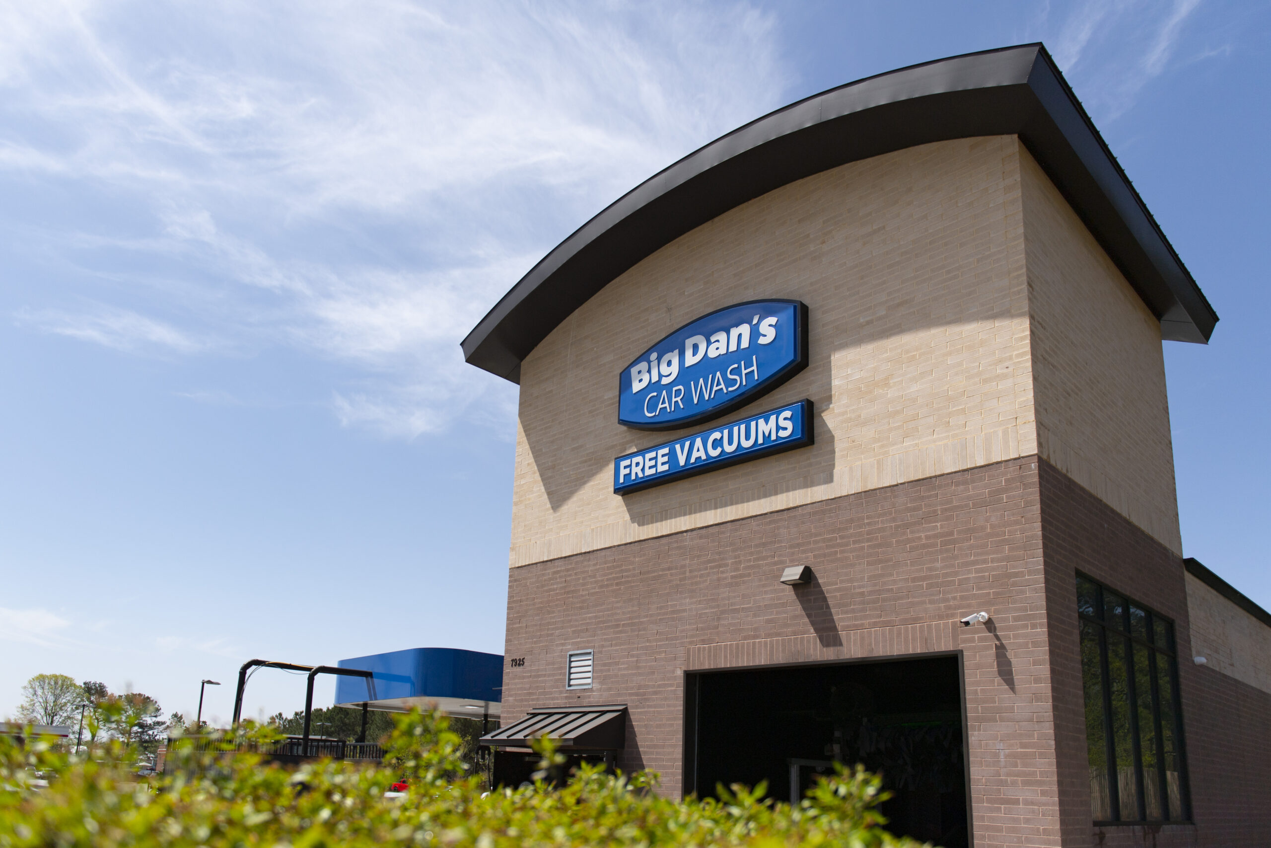 Exterior of Big Dan's Car Wash Sign with Free Vacuums